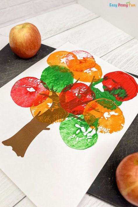 Create a vibrant fall masterpiece with Apple Stamping Fall Tree Art! Combining tree crafts, fall crafts for kids, and apple stamping art ideas, kids will love using apple slices as unique stamps to design a beautiful fall-inspired work of art. Apple Stamping Craft, Fall Tree Art, Apple Stamping, Simple Art Activity, Leaf Print Art, Crafts Fall, Apple Craft, Fun Fall Crafts, Fall Arts And Crafts