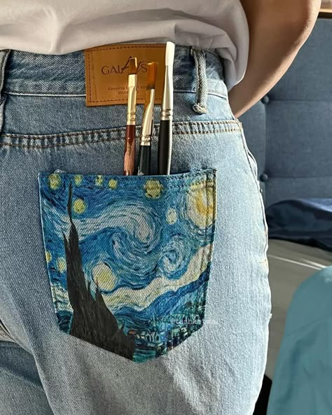 The Starry Night Pocket Jeans by @galartsy. 💙🌙✨ • P.S. - You can use my code “Natasha10” to get some extra % off! 🩵 • • • [Van Gogh art, Van Gogh painting, the starry night, acrylic painter, acrylic artwork, Van Gogh inspired] • • #vanGogh #StarryNight #vanGoghArt #vanGoghInspired #vanGoghAesthetic #ArtWithTash #ａｅｓｔｈｅｔｉｃ #RoomAesthetic Painting Jean Pockets, Painting In Jeans, Drawing On Jeans Ideas Aesthetic, Van Gogh Aesthetic Outfits, Van Gogh Outfit Aesthetic, Starry Night Clothes, Starry Night Outfit Ideas, Acrylic Painting On Clothes, Jeans Pocket Painting