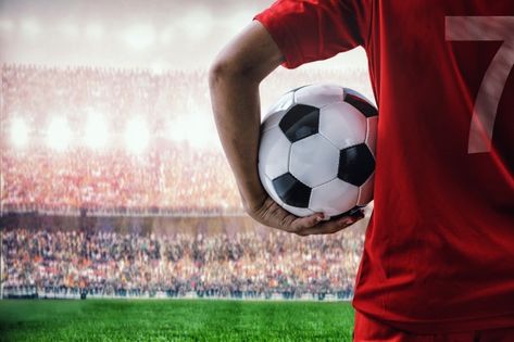 Red team soccer player in the stadium | Premium Photo #Freepik #photo #man #red #football #soccer Football Bedroom, Soccer Academy, Football Tournament, Fc Liverpool, Stoke City, Red Team, Collage Poster, Netball, Leeds United