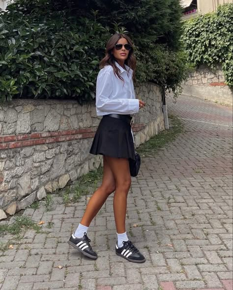 fashion outfits , fashion inspo outfits , fashion , fashion trends 2023 , outfits , outfit ideas summer , outfits aesthetic , outfit inspo summer , aesthetic clothes , ralph lauren , ralph lauren aesthetic , summer outfits 2023 , summer , celine , chanel shoes , chanel aesthetic , chanel looks , hermes aesthetic , hermes looks , looks , lookbook , streetwear fashion , street wear , street style , ootd , fall aesthetic , fall outfits , fall looks , hermes purse , hermes inspo , life inspo Black Samba Shoes Outfit, Tennis Skirt Outfit Street Style, Mum Fits, Black Tennis Skirt Outfit, Fall Skirt Outfits, Adidas Samba Women, Fav Outfit, Black Tennis Skirt, Adidas Samba Outfit