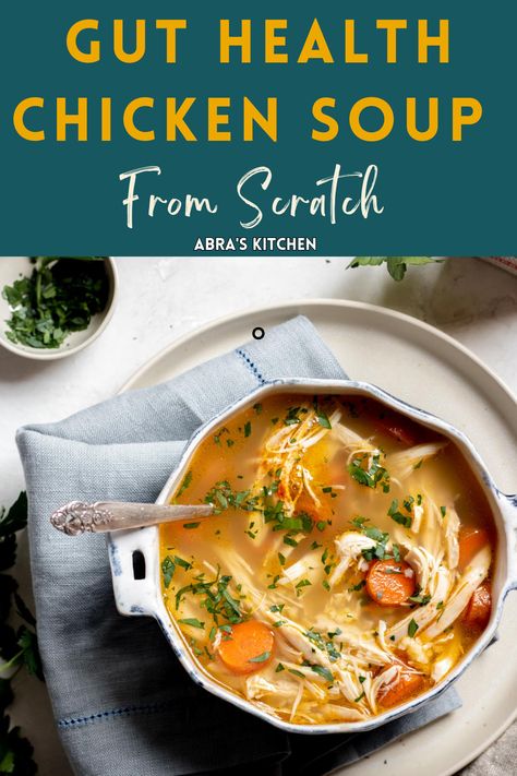 bowl of chicken soup on a plate with a blue linen napkin. Healthy Chicken Broth Soup, Leaky Gut Soup, Meals To Heal Your Gut, Gut Healing Soup Recipes, Soup For Stomach Bug, Gut Health Soup, Chicken Soup Healing, Healing Gut Soup Recipes, Gut Healthy Soup