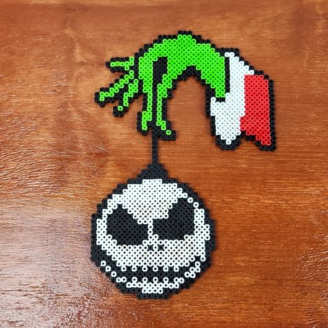 The Grinch & Nbc Jack Skellington Christmas Perler Bead Pixel Art Collectible Measures Approx. 10.5" High 7" Wide Handmade Perler Art Designed Entirely Out Of Perler Beads This Is A Unique Handmade Item These Make Great Gifts, Collectibles, Wall Art Etc. Check Out Our Other Items To Make Bundles. If You Like Any Items, I Will Send An Offer To You, Including The Seller Discount Of 10% Off 2 Or More Items Ships Same Or Next Day! Thank You! Thank You! Christmas Perler Bead Patterns Big, Perler Bead Hanging, Iron Man Perler Bead Pattern, Nightmare Before Christmas Melty Beads, Perler Bead Patterns Grinch, Gingerbread Man Perler Beads, Wrestling Perler Bead Patterns, Pearl Or Bead Patterns, Perler Beads Square