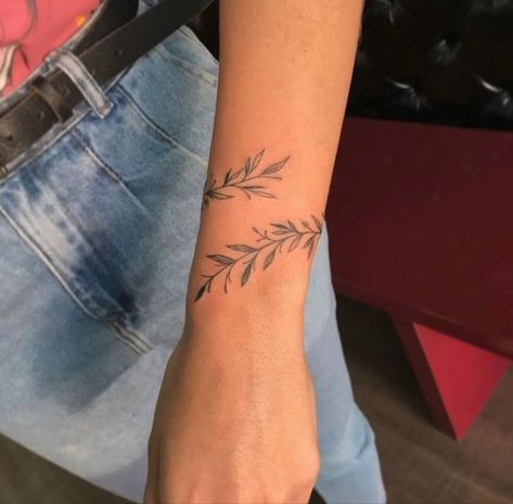 Delicate Arm Cuff Tattoo, Dainty Small Arm Tattoos, Wrap Around The Wrist Tattoos, Olive Branch Tattoo Arm Wrap Simple, Minalistic Tattoos, Rap Around Tattoo Arm, Wrist Wrap Around Tattoos, Wrap Around Vine Tattoos, Wrist Vine Tattoos