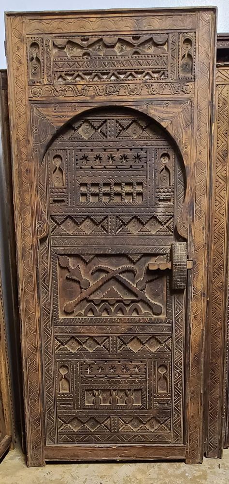 "Antique African touareg door Great ethnic African carving Solid wooden door Exterior / interior door Great workmanship.  ONE OF A KIND. Not a reproduction  Measures 89\" x 40\"  Great for indoor use HAWAII & ALASKA SHIPPING IS EXTRA AND WILL APPLY. PLEASE CONTACT US BEFORE BUYING THIS DOOR TO ARRANGE FOR SHIPPING"