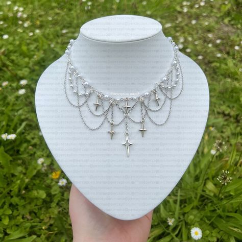 🤍White🤍 New handmade necklace made of white beads and a star pendant ! 🌝 (Check my Vinted : momoperception) • • • • • SEO : handmade necklace, artisan jewelry, beaded necklace, handcrafted jewelry #HandmadeNecklace #ArtisanJewelry #BeadedNecklace #HandcraftedJewelry #EthicalFashion #HandmadeWithLove #UniqueJewelry #JewelryDesigner #FashionAccessories #GiftIdeas #HandmadeGift #StylishJewelry #ElegantStyle #CraftedWithCare #JewelryAddict Diy Jewelry Earrings, Beaded Necklace Designs, Beaded Necklace Diy, Handmade Jewelry Tutorials, Jewelry Beaded, Handmade Wire Jewelry, White Necklace, Beaded Jewelry Diy, Stylish Jewelry