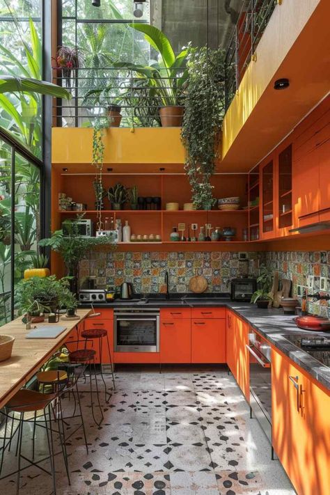 The design of this kitchen is a vibrant showcase of maximalism, featuring a diverse range of elements such as a stylish countertop, modern cabinetry, a sleek sink, a chic table with matching chairs, a touch of greenery from a houseplant, and elegantly tiled flooring. The harmonious blend of colors creates an energetic and welcoming indoor space that exudes personality and charm. #MaximalistStyle #VibrantDesign #ColorfulInteriors #InteriorInspiration Kitchen Maximalist, Maximalist Kitchen Design, Maximalist Kitchen, Deco Studio, Yellow Kitchen, Interior Modern, Dream Apartment, Kitchen Inspo, Dream House Decor