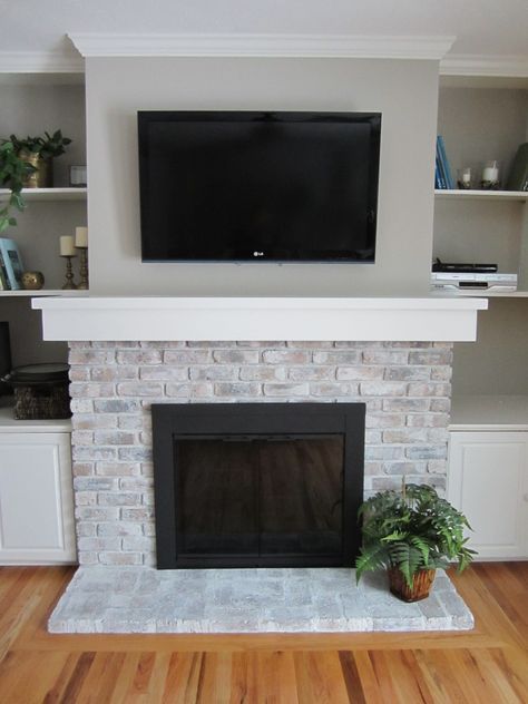 See how to white wash your fireplace for an inexpensive update! / HomeStagingBloomingtonIL Mantle Redo, Fireplace Mantle Designs, Brick Fireplace Mantles, White Wash Brick Fireplace, Painted Brick Fireplace, Painted Brick Fireplaces, Fireplace Redo, Paint Fireplace, White Wash Brick