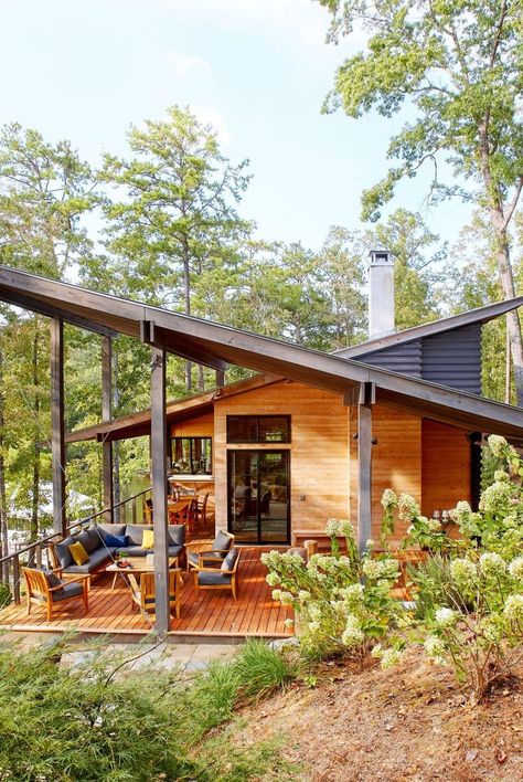 Modern lines and casual living make this lake house blend into the environment. #lakehouse #lakeliving #alabama #interiordesign #southernliving Wooden Cabin, Modern Lake House, Lakeside Living, House Blend, Lake Cabins, Tiny House Cabin, Small Cabin, Cabin In The Woods, Modern Cabin