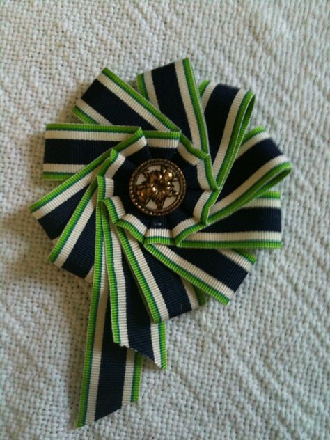 Make a Ribbon Cockade : 10 Steps - Instructables Ribbon Cockade, Diy Ribbon Crafts, How To Make Rosettes, Lace Weaving, Award Ribbons, Award Ribbon, Ribbon Pin, Fabric Origami, Ribbon Ornaments