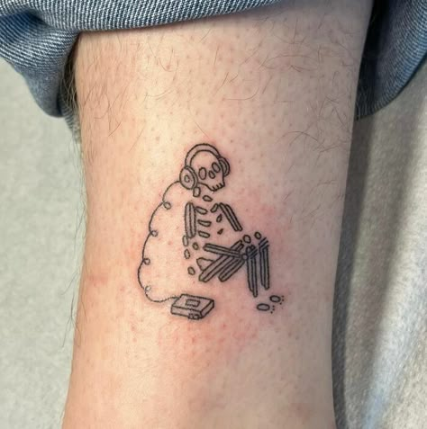 Handpoked Music Loving Skeleton Tattoo Skeleton And Music Tattoo, Goofy Skeleton Tattoo, Small Tattoos Skeleton, Skeloten Tattoo, Small Skeleton Tattoo Ideas, Music Saved Me Tattoo, Tattoos Related To Music, Skeleton Listening To Music Tattoo, Tattoos Music Ideas