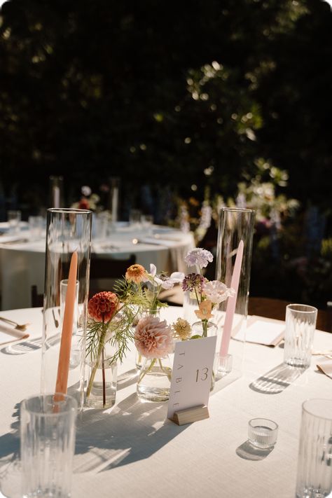 Table Bud Vases Wedding, Centerpieces With Taper Candles, Tiny Vase Centerpiece Wedding, Single Bud Vase Centerpiece Round Table, Garden Style Wedding Florals, Summer Wildflower Centerpieces, Flower Buds Centerpiece, Bud Vases For Wedding Tables, Bid Vases Wedding