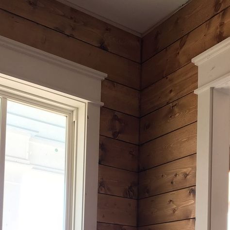 Janea Spades on Instagram: "I can’t even express how thrilled I am with the decision to stain the shiplap in one room! Wish I had a couple of other places unpainted to do this - but so glad to have it here! 😍 The wood is pine and the stain is Provincial by Minwax @tridantbuilders ripped every single board to make this happen. 👏🏻#spadesfourgables #tridantbuilders #mitchginndesign #fourgables #minwaxstain" Shiplap Wall Stained, Interior Pine Walls, Wood Walls In Kitchen, Shiplap With Trim, Stained Pine Walls, Shiplap Painted Walls, Pine Walls Cabin, Pine Interior Cabin, Blue Pine Walls