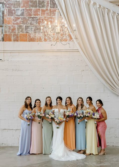 Colorful mixed and matched bridsmaid dresses! Perfect for spring and summer weddings. Spring Wedding Colors Dresses, Spring Bridesmaids Dress, Bridesmaid Dresses Pale Skin, Wedding Pastel Bridesmaid Dresses, Colour Palette Dress Code, Brides With Bridesmaids, Satin Bridesmaid Dresses Mismatched, Bridesmaids Wearing Different Colors, Bridesmaid Dress Multi Color