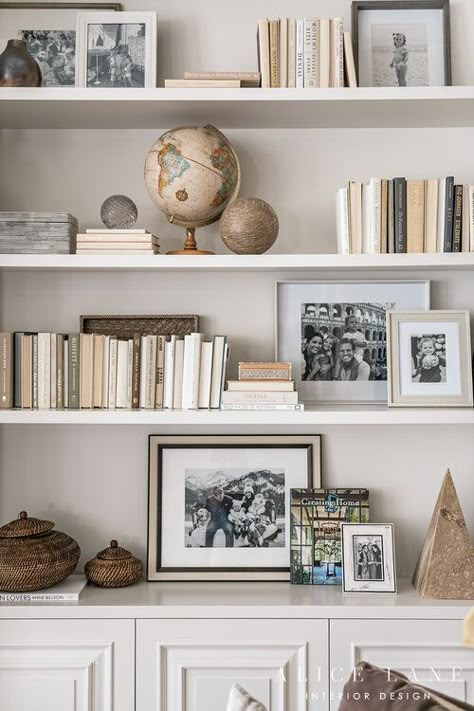 Love this shelf styling! How to style books, photographs, picture frames, and objects on shelves or bookshelves. Lovely neutral colour scheme. PARCELL HOME — ALICE LANE INTERIOR DESIGN Shelf Styling With Books, Shelf Astethic, Floating Shelves Office Decor, Styling Bookcases, Bookcase Decorating, Shelves Styling, Styled Shelves, Niche Decor, Traditional Home Magazine