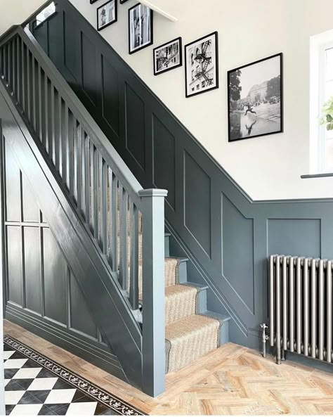 Panelling On Side Of Stairs, Wooden Panelling Staircase, Dark Blue Stairway, Dark Paint Staircase, Stair Panelling Colour, Black Staircase With Panelling, Navy Banister Stairways, Dark Blue Hallway And Stairs, Dark Grey Panelling Hallway