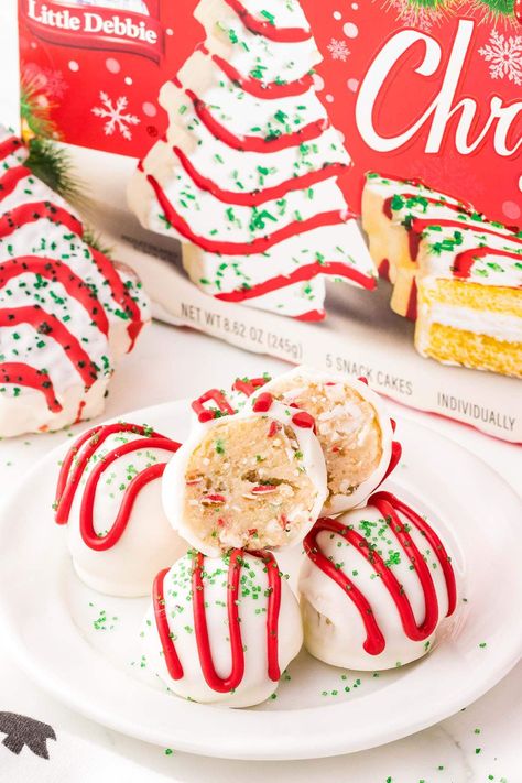 Christmas Cookie Cake Balls, Little Debbie Tree Cake Pops, Dessert Balls Recipes, Christmas Tree Cake Balls Little Debbie, Cake Pops Using Store Bought Cake, Little Debbies Christmas Tree Cake Pops, Grinch Red Velvet Cake Balls, Cake Pop Display Ideas Christmas, Peppermint Cake Balls