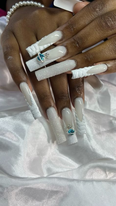 White Creative Nails, Long White Acrylic Nails With Gems, Milky White Nails Charms, White Dramatic Nails, Creamy Nails Design, White Based Nails, Stilleto Nails White, White On White Nail Designs, Soft White Nails Acrylic With Design