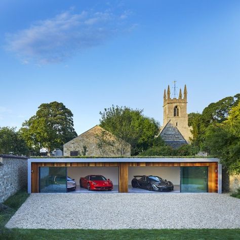 a wide single Storey home garage with sliding glass doors Large Sliding Glass Doors, House In England, Garage Extension, Timber Garage, Dream House Aesthetic, Garage Design Interior, 5 Car Garage, Luxury Car Garage, Carport Garage