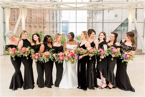 Black With Wildflowers Wedding, Stain Bridesmaid Dresses, Black Bridesmaid Dresses Bright Florals, Black With Bright Colors Wedding, Black Bridesmaid Colorful Flowers, Black Bridesmaid Dress With Colorful Flowers, Black Wedding With Bright Flowers, Black Bridesmaid Dress Colorful Bouquet, Black Bridesmaid Dresses Colorful Bouquets