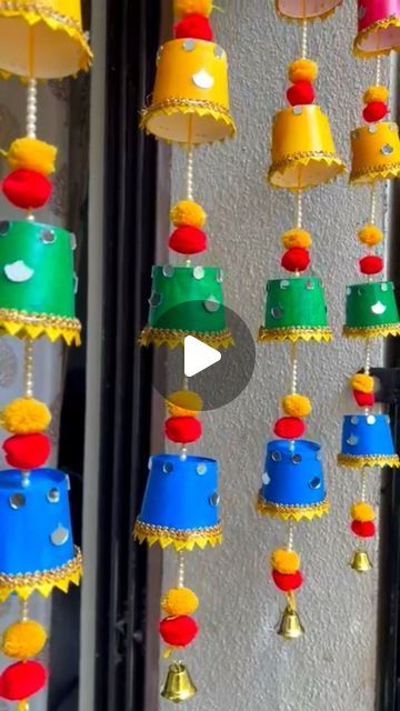 Colours Creativity Space on Instagram: "Diwali Decor DIY 10 🪔🌼 Try this diy soon👍❤️ super easy and beautiful looking 👌 Diwali garland Diwali decoration Diwali door hanging 🌼 Follow @colours_creativity_space for more 👍 🌼Material : papercups, Acrylic Colours, pompom , pearls, bell and string #diwalidecor #papercupcraft #doorhanging #diwalidiy #garland #festivaldiy #kidsactivity #schoolactivity #reuserecycle #festivaldecoration #Diwali #festivevibes #trending #craftreel" Easy Paper Crafts For Diwali, Hanging In School Decoration, Easy Diwali Diy Crafts, Diwali Decorations At School For Kids, Hanging Craft For School Decoration, Railing Decorations For Diwali, Diwali Decor Handmade, Subh Labh Design Handmade Diy Video, Diwali Craft Ideas For School Students