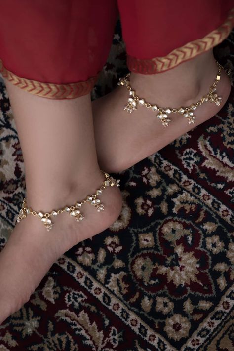 Buy Gold Plated Kundan And Seed Pearls Embellished Anklets - Set Of 2 by Paisley Pop Online at Aza Fashions. Sit Still Look Pretty, Silver Anklets Designs, Anklets Indian, Ethereal Jewelry, Wedding Anklets, Saree Styling, Diamond Anklet, Eid Outfit, Anklet Designs