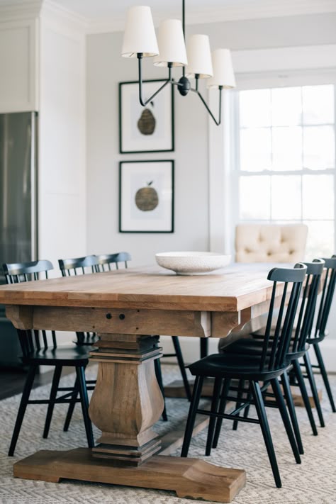 This combination doesn't get old - wood table, black chairs, neutral rug, linear chandelier, white centerpiece bowl. And there's so much room to play with style and shape to make it yours. We love when a client is willing to go bold and out of the box. We also love this - simple and timeless. Where do you fall on the scale of Simple and Timeless to Bold and Unique? #designingfavoriteplaces Design: @grayoakstudio Project: Prospect Dining Room Photography: @callanphoto Wood Table Black Chairs, White Table Black Chairs, Table Black Chairs, Black Kitchen Chairs, Black Wood Dining Table, Timeless Dining Room, Light Wood Dining Table, Happy Thanksgiving Everyone, Chandelier White