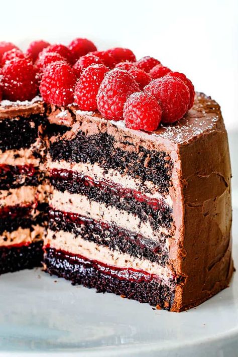 Chocolate Raspberry Cake with Raspberry Jam, Chocolate Mascarpone & Chocolate Ganache Chocolate Cake With Raspberry Filling, Chocolate And Raspberry, Carlsbad Cravings, Chocolate Raspberry Cake, Raspberry Pie, Baking Cocoa, Dark Chocolate Cakes, Raspberry Filling, Raspberry Cake