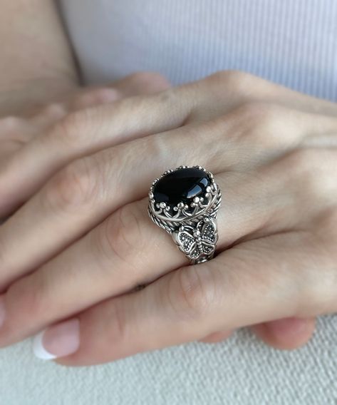 🦋✨ Transform your look with the elegance of nature! Our exquisite 925 Sterling Silver Filigree Butterfly Cocktail Ring is a true masterpiece, featuring intricate details and the captivating allure of Black Onyx - a gemstone fit for January babies and beyond! 🖤 Ready to make a statement? Flutter over to our #EtsyShop and let your style soar. Click to discover or indulge: https://nuel.ink/BQpy5P #SterlingSilver #BirthstoneBling #ButterflyJewelry #HandmadeLuxury Silver Rings With Black Stones, Black Onyx Rings Women, Black Stone Ring Women, Butterfly Cocktail, Black Gemstone Ring, Stone Ring Design, Jewelry Rings Unique, Double Butterfly, Black Jewellery