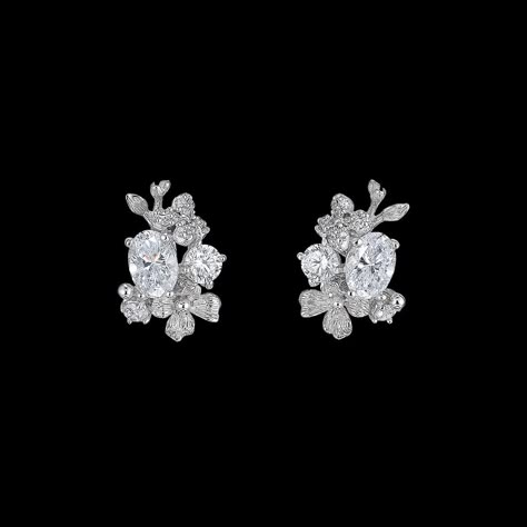 ENGLISH GARDEN COLLECTIONA beautiful and delicate pair of ear studs in 18k white gold and rhodium vermeil with 14k ear posts and butterfly backs, intricately hand-set with laboratory-grown simulated white diamonds of 2.8 carats in total weight.     Explore All Matching CreationsHand-crafted in the United Kingdom.#jewelrylover #handcraftedjewelry #jewelryinspiration #jewelrydesign #jewelryobsessed #jewelryoftheday #jewelrygoals #jewelryfashion #jewelrytrends Gold Diamond Studs, Diamond Jewelry Designs, Jewelry Fashion Trends, Classy Jewelry, Hanging Earrings, Girly Jewelry, English Garden, Dream Jewelry, Pretty Jewellery