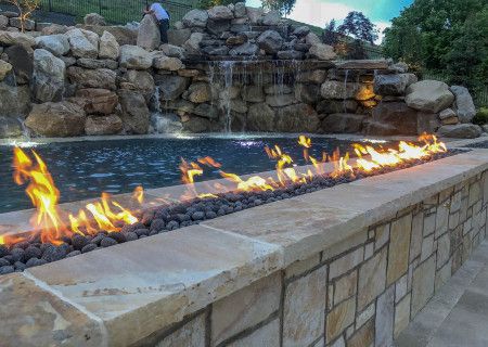 Pavers And Pebbles, Pool With Lazy River, Fire Feature Pool, House Patio Ideas, Outdoor Area Ideas, Insane Pools, Pool Kings, Mexican Beach Pebbles, Tall House