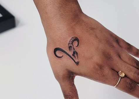 #Aries ♈️ #handtattoos #zodiac #finelinetattoo #minimaltattoo #daintytattoo #greenvillesc #SouthCarolina #tattooartist Rams Tattoo Aries, Ram Finger Tattoo, Mens Aries Tattoo, Men’s Aries Tattoo, Aries And Taurus Tattoo Together, Simple Aries Tattoo Design, Tattoo Ideas Female Meaningful Aries, Aries Horns Tattoo, Aries Tattoo On Hand