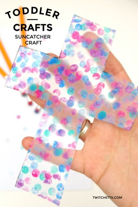 Learn how to make this easy cross suncatcher with these step-by-step instructions. This cross craft uses contact paper to create easy sun catchers. It's perfect for VBS, Sunday school project, or crafting at home. #cross #suncatcher #craftsforkids #twitchetts Diy Cross Crafts For Adults, Cross Crafts For Preschoolers, Cross Suncatcher Craft, Preschool Bible Crafts Easy, Christian Crafts For Kids Easy, Bible School Crafts For Kids, Suncatchers For Kids, Vacation Bible School Crafts, Christian Preschool Crafts