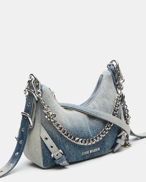 The VITAL denim bag features a slim hobo-inspired silhouette with buckle, chain, and grommet hardware giving the design a little edge. Distressed denim mini hobo bag Top zipper closure Interior zipper pocket Adjustable top handle with buckle hardware Top handle strap drop: 8 inches Crossbody strap drop: 24 inches  6.5i Mini Hobo Bag, Denim Bags, Denim Handbags, String Bag, Jeans Bag, Denim Bag, Denim Mini, Denim Fabric, Crossbody Strap