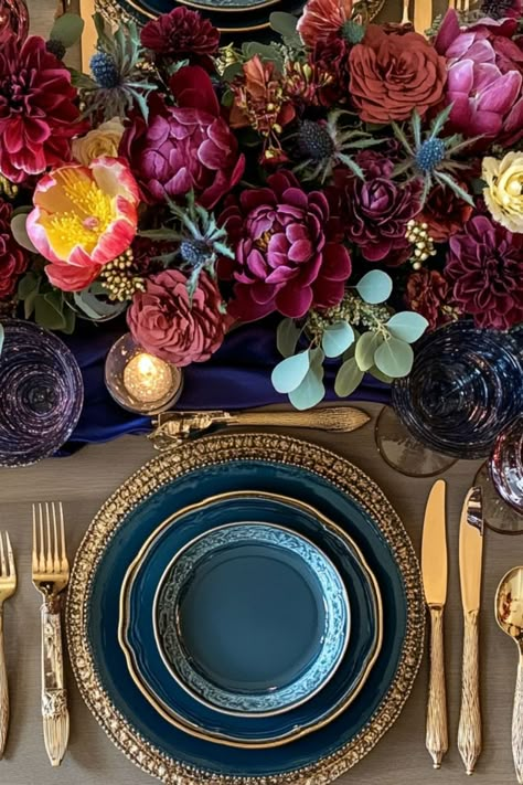 Embrace bold jewel tones for a vibrant and unique Thanksgiving color scheme. #ThanksgivingColors #BoldDecor #JewelTones Jewel Tone Flowers Centerpiece, Jewel Tones Birthday Party, Jewel Tones Table Setting, Royal Color Palette Jewel Tones, Jewel Toned Wedding Decor, Jewel Themed Party, Jewel Themed Wedding, Jewel Tone Birthday Party, Jewel Tone Tablescape