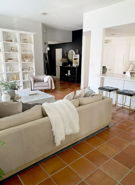 Saltillo Tile Home Decor, Terra Cotta Tile Floors Living Room, Rug Over Tile Floor Living Rooms, Saltillo Tile Dining Room, Saltillo Tile Modern Decor, Red Tiles Living Room, Living Rooms With Terracotta Floors, Mexican Tile Living Room, Red Tile Living Room