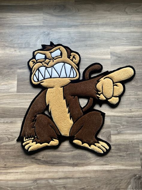 Handmade custom tufted Evil Monkey! Made To Orders take about 7-10 days to be made and shipped out depending on size! Each tufted rug is carefully crafted and carved to perfection giving an almost 3D appearance that you can see and feel. Each piece is a luxury decor addition to the interior floors of your home.  Also an amazing gift for your family or friends! I specialize in creating custom rugs from any design such as Business logos, Faces, Animals, Etc. via photos and I also offer graphic design assistants with original concepts to make your dreams a reality in rug form! - - - - - *Made with 100% hypoallergenic acrylic yarn. *All tufted rugs are extremely soft and durable with a felt backing finish on the back. *Keep the rug in a low traffic area and away from any moisture. *Use low wat Teddy Bear Rug, Mens Rug, Character Rugs, Custom Rugs Design, Rug Form, Rugs Custom, 3 Monkeys, Tufting Diy, Weird Furniture