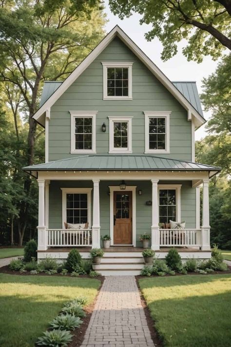 14 Green Paint Colors for the Exterior -Transform Your Home with These Stunning Shades - West Magnolia Charm Two Tone Farmhouse Exterior, Outside Home Paint Colors Ideas, Red And Green House Exterior, Light Green Farmhouse Exterior, Cozy Exterior House Colors, Light Sage Green House Exterior, Green House Wood Shutters, Craftsman Exterior Paint Schemes, Clary Sage House Exterior