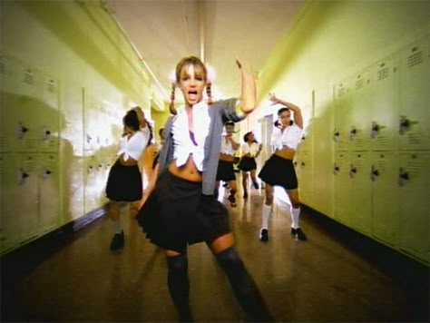 Britney Spears in her ‘Baby One More Time’ music video. (Courtesy of Vevo) Iconic Women Costumes, Britney Spears Halloween, Britney Spears Boyfriend, Britney Spears Music Videos, Britney Spears Costume, Britney Spears Music, Music Video Outfits, Britney Spears Outfits, Spiegel Selfie