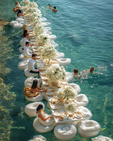 See more of this water wedding that is an ideal fit for the mermaid in all of us. Water Proposal Ideas, Wedding Theme Ideas Beach, Wedding In Water, Wedding On Water, Mermaid Wedding Ideas, Mermaid Wedding Theme, Mermaid Inspired Wedding, Mermaid Themed Wedding, Mermaid On The Beach