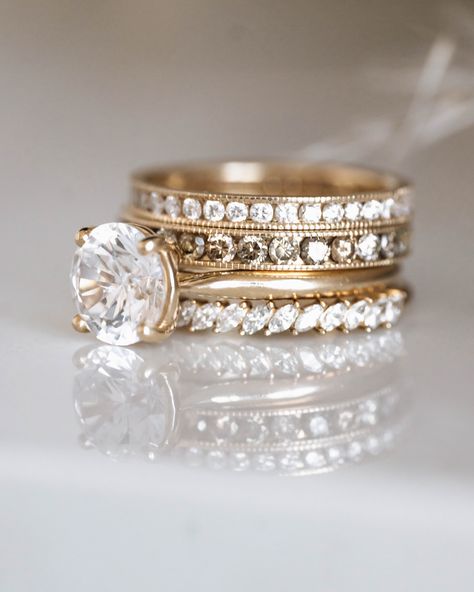 BOLD and beautiful represents this stack! Our Parlor Palm engagement ring is eye-catching with the Petite Domino Marquise, the Small Pea Pod with white diamonds and the Large Pea Pod with gray diamonds. Would you wear this stunner?! Stacked Engagement And Wedding Rings Silver, Alternative Gold Engagement Rings, Mixed Metal Diamond Ring, Engagement Ring With Stackable Bands, Gold Stackable Diamond Rings With Round Band, Gold Stackable Wedding Rings With Diamond Accents, Gold Stackable Diamond Ring With Round Cut, Engagement Ring Stacking Ideas, Stacked Wedding Rings Mixed Metals