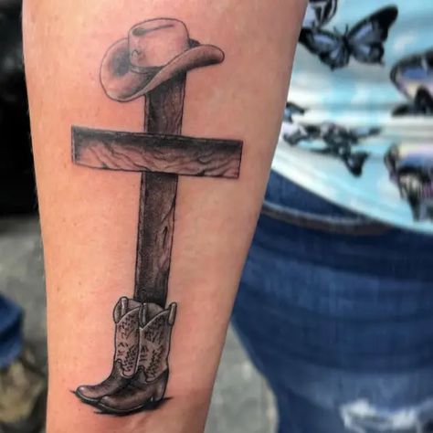 Electrik Needle Tattoo Cowboy Remembrance Tattoo, Cowboy Hat Memorial Tattoo, Country Forearm Tattoo Men, Cross With Cowboy Hat Tattoo, Cowboys And Angels Tattoo, Judas Ate Too Tattoo, Western Tattoos For Men, Cowboy Tattoos For Men, Brilliant Tattoo