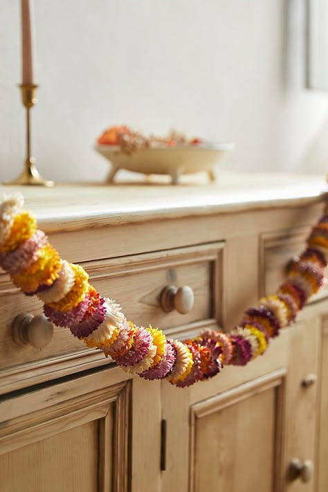 Add natural color and texture to the mantel with this gorgeous garland. Made up of dried helichrysum flowers for a festive, celebratory look. | Preserved Helichrysum Garland at Terrain Marigold Garland, Cozy Thanksgiving, Faux Hydrangea, Fall Things, Harvest Decorations, Wreaths & Garlands, Easter Shopping, Dried Floral, Creative Living