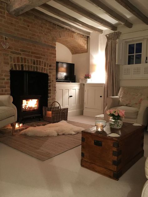 French Gite Interior, Cosy Farmhouse Exterior, Red Brick Chimney Living Room, Red Brick House Interior Living Rooms, Red Brick Fireplace Decor Ideas, Cosy Den Ideas, Cosy Basement Ideas, Brick Chimney Living Room, Red Brick Fireplace Living Room