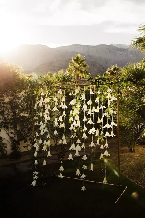 Get inventive with your wedding arch with suspended strands of florals. We love that this couple chose to stick with simple white flowers and a gold stand for this classic tropical wedding. Click the link for more stunning wedding ceremony backdrops. // Photo: Tony Wodarck, Design + Planning: After The Engagement, and Florals: The Lavendar Rose Vows For Her, Ocean Flowers, Gary Clark Jr, Gary Clark, Emotional Wedding, Wedding Altars, Wedding Ceremony Backdrop, Wedding Backdrops, Palm Springs Wedding