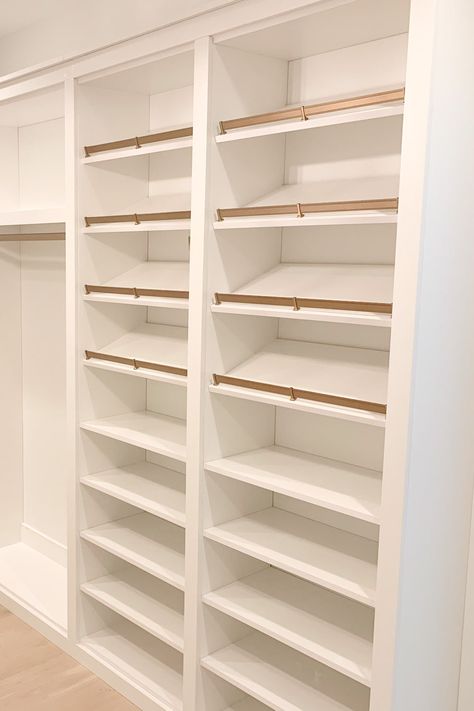 The only thing missing is the shoes! Your shoe rack plays an important role in your closet's organization, allowing you to neatly organize your shoes in any way that works for you. 📸: The Tailored Closet of Nashville Wardrobe Design Shoe Rack, Master Walk In Closet Shoe Storage, Shoe And Accessory Closet, Master Closet Shoe Shelves, Built In Shoe Shelves Closet, Walk In Closet Ideas With Shoe Rack, Shoe Rack Walk In Closet, Walk In Closet Accessories, Custom Shoe Closet