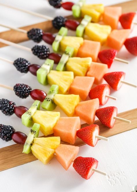 Colorful fruit kabobs are the best appetizer or side for any occasion! Load up your favorite fruits and get snacking. Rainbow Fruit Kabobs, Dessert Kabobs, Yogurt Fruit Dip, Luau Party Food, Rainbow Snacks, Luau Food, Fruit Kebabs, Cut Strawberries, Easter Appetizers