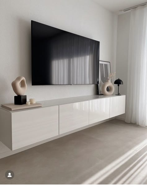 Minimalist Library Room, Living Room Tv Aesthetic, Apartment Bedroom Design Ideas, Aesthetic Tv Room, Beige Aesthetic Living Rooms, Living Room Aesthetic Minimalist, Warm Minimalism Interior, Floating Tv Unit, Neutral Contemporary