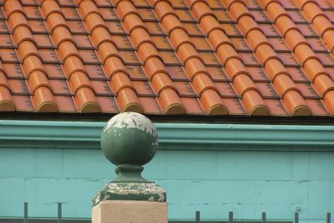 A terracotta roof on a pale turquiose house Terracotta Roof Colour Scheme, Terracotta Roof House Exterior Colors, Terracotta Roof House, Terra Cotta Roof, Painting A House, Brown Roofs, Roofing Design, Terracotta Roof Tiles, Roof Paint