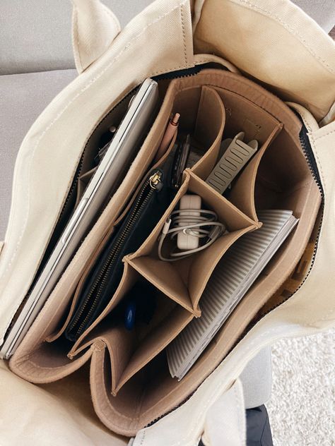 if you have a tote bag you NEED this tote organizer !! Comes in so many different sizes & is so nice to keep everything organized!! #organizing #totebag #salealert Follow my shop @maddyytrueman on the @shop.LTK app to shop this post and get my exclusive app-only content! #liketkit #LTKitbag #LTKU #LTKunder50 @shop.ltk https://liketk.it/3Qz8G Organized Bags And Purses, Everything Tote Bag, School Bag Organizer, Make Up Bag Organizer, University School Bag, Office Bag Organization, Bag In Bag Organizing, Whats In My Marc Jacobs Tote Bag, Organized Work Bag