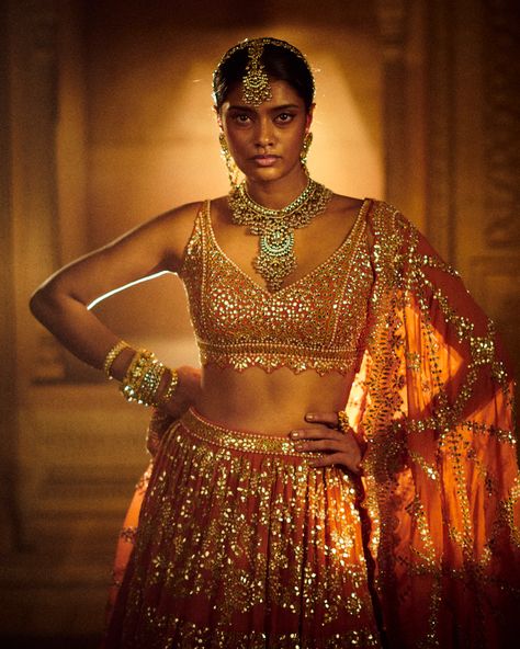 Burnt Orange Bridal Lehenga | Seema Gujral Burnt Orange Lehenga, Orange Indian Outfit, Gota Patti Embroidery, Tiered Lehenga, Three Tiered Skirt, Seema Gujral, Orange Lehenga, Embroidered Lehenga, Party Wear Lehenga